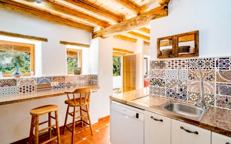 Kitchen has breakfast table with views